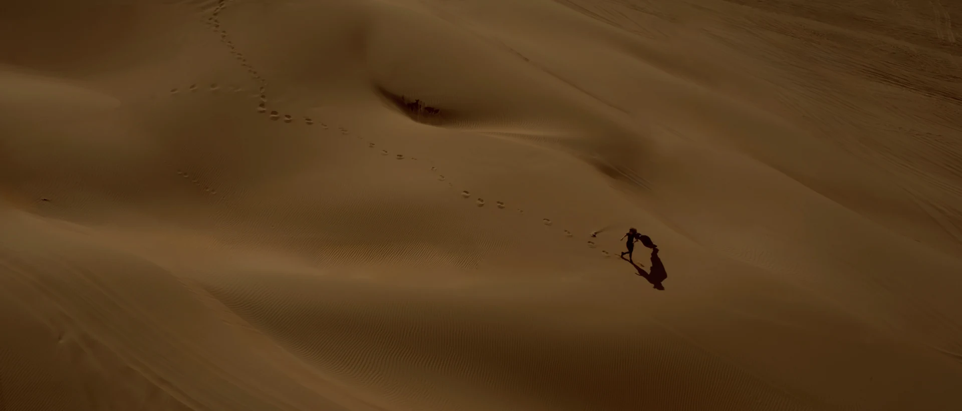A quiet figure in the desert landscape