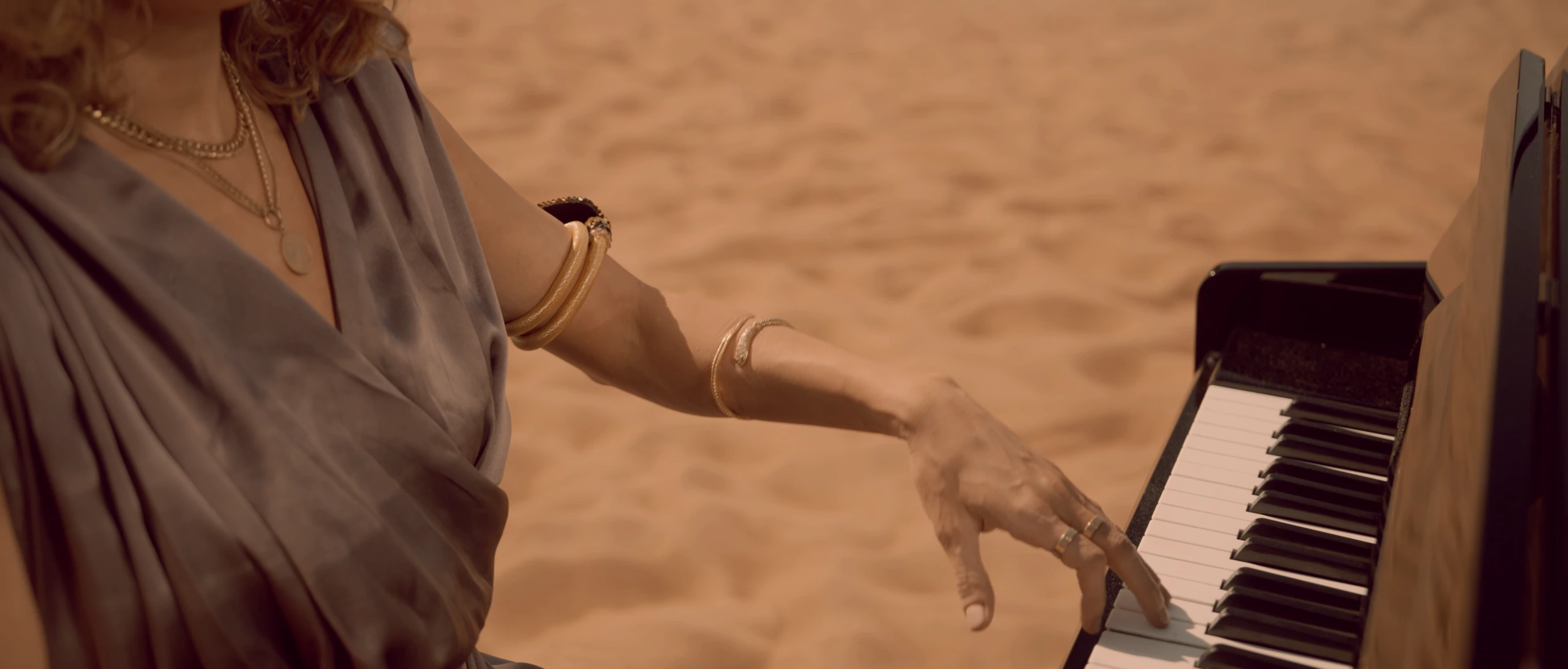 Desert Performance — Piano detail in the open desert